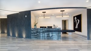 No longer just relegated to kitchens and bathrooms, tile is a popular choice for new construction